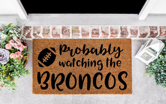 Probably watching the Broncos door hanger, broncos, football, broncos bedroom decor, denver,colorado, broncos gifts, football gifts for men