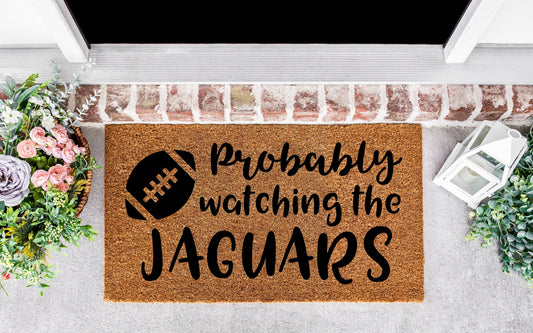 Probably watching the Jaguars doormat, Jacksonville, Jaguars, jaguars, football mom, jacksonville florida, jaguars, football gifts,
